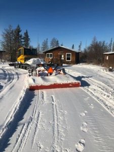 Snow Trail Groomer and Warming Cabin