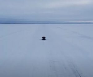 Drone shot of truck on NW Angle Guest Ice Road