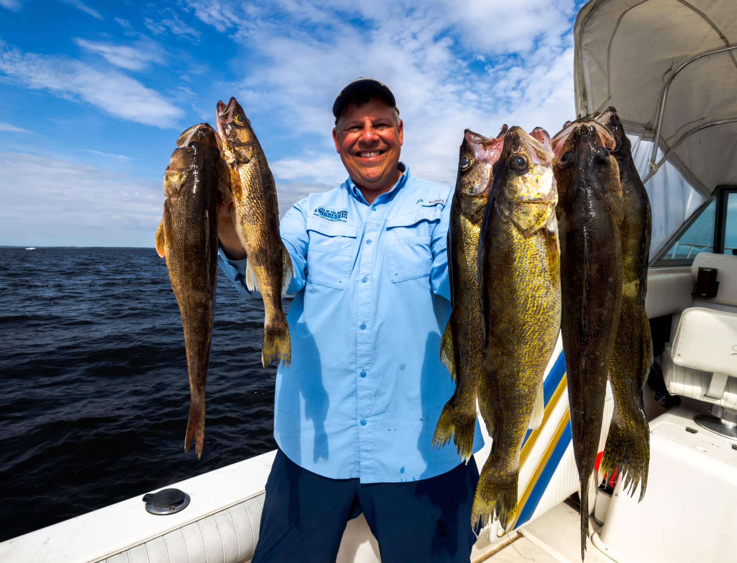 Joe Henry with a limit of Lake of the Woods walleyes and saugers