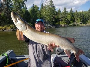 Jesse Sutherland with a big Lake of the Woods muskie_fish the NW Angle