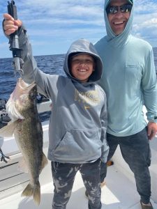 father and son fishing for walleye