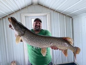 big pike in fish house 022423 arnesens rocky point