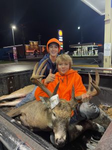 Eli Johnson and Nolan Fish with big buck deer hunting youth hunt MN