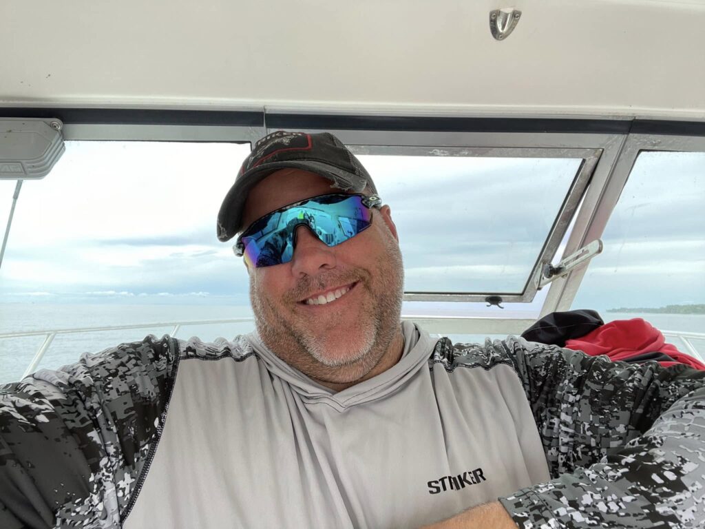 Bryan "Beef" Sathre in a Lake of the Woods charter boat