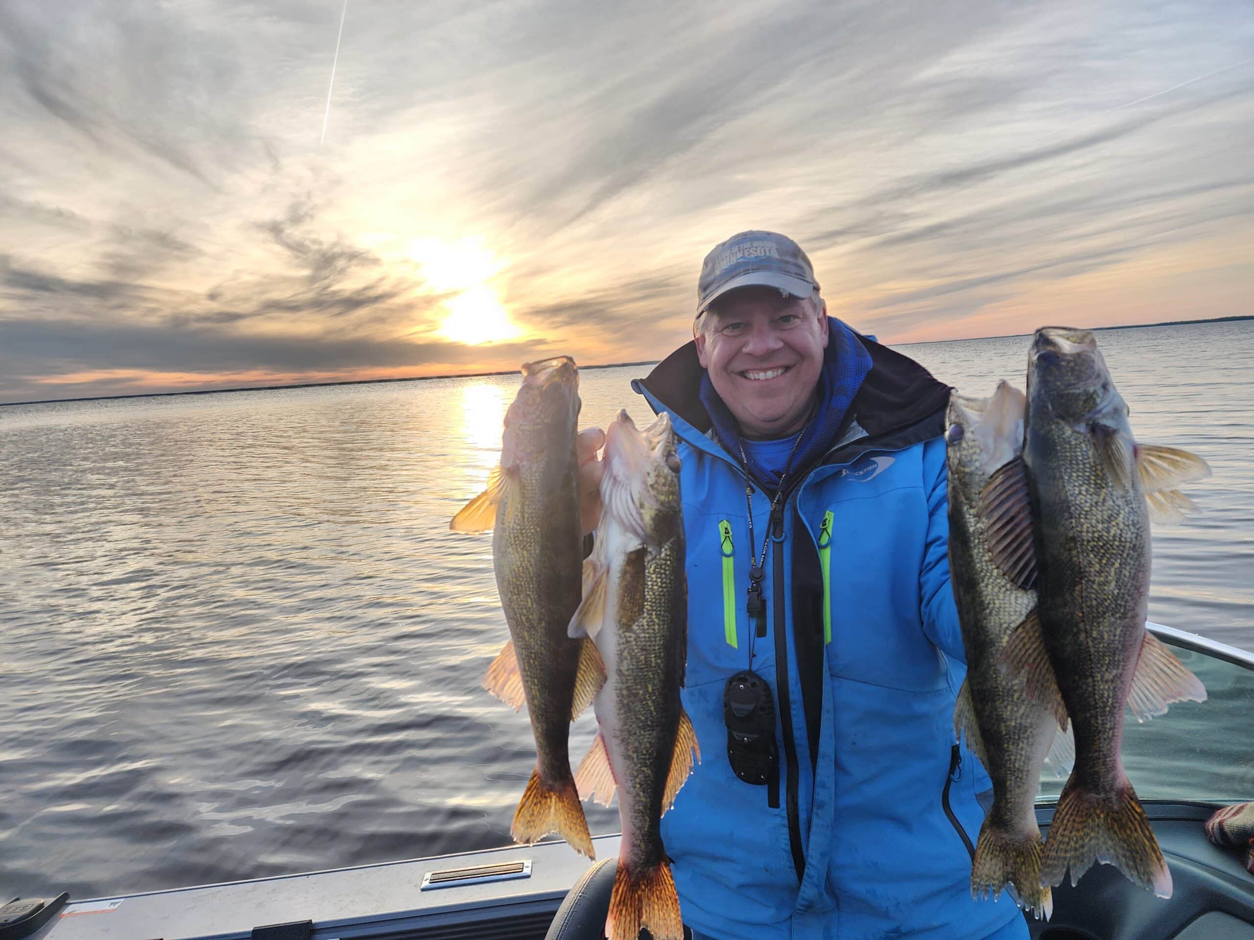 Joe Henry with a limit of walleyes on Lake of the Woods at sunset