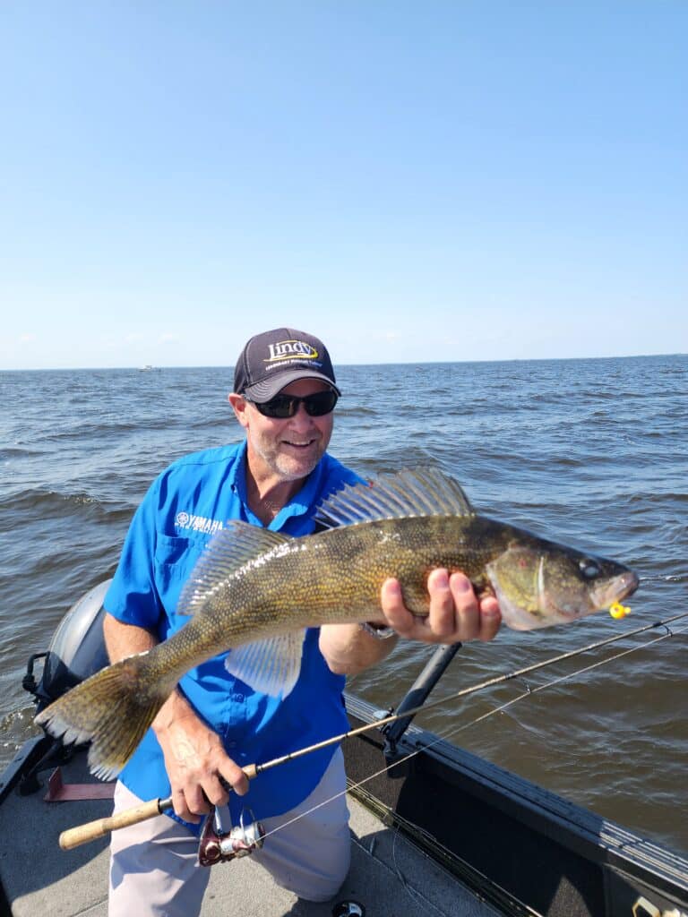 Jon Thelen, Destination Fish with a summer walleye on Lake of the Woods