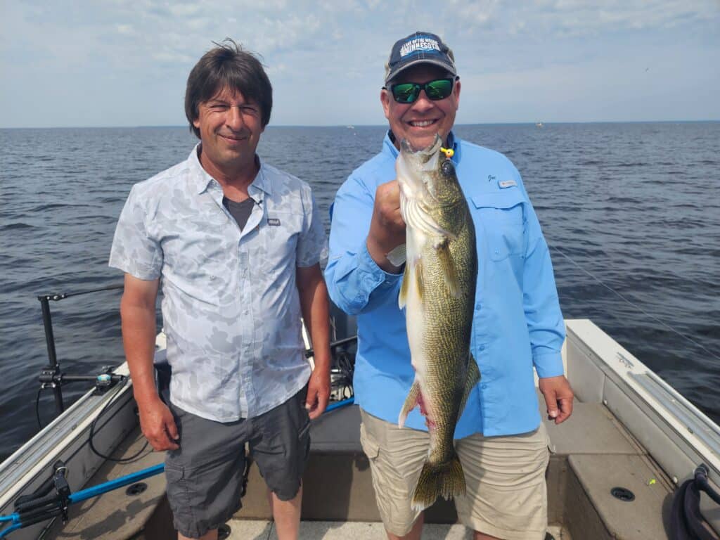 Greg Jones and Joe Henry with a walleye caught on a jig on Lake of the Woods