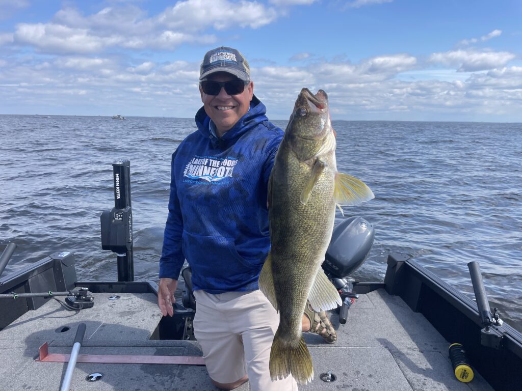 Joe Henry with a trophy walleye pulling spinners on Lake of the Woods