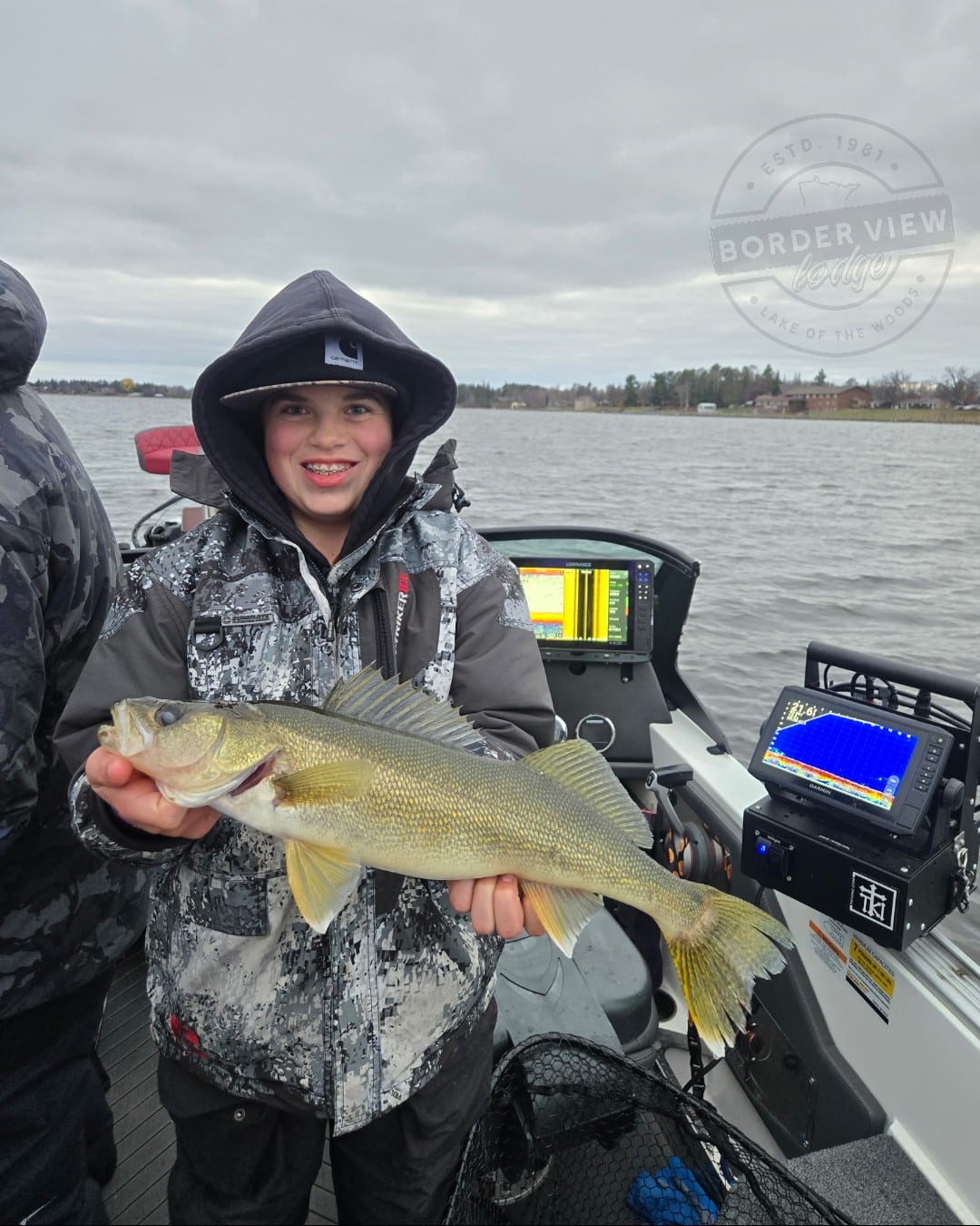 This boy caught a huge fall walleye on the Rainy River near Lake of the Woods MN.