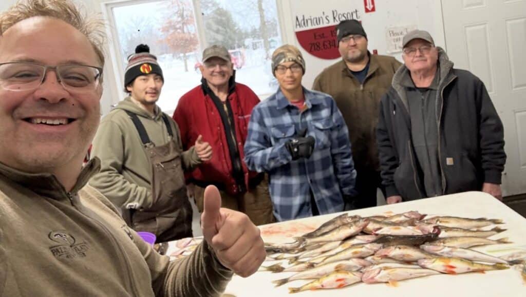 anglers with walleyes and saugers-a great catch on lake of the woods mn