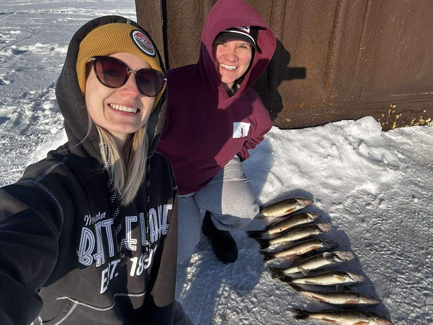 two female anglers with great walleye sauger catch at oak island lake of the woods mn