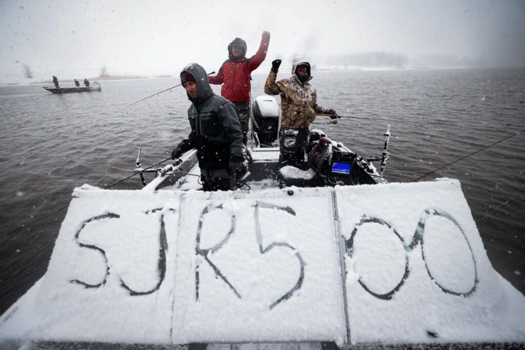 SJR500 written in snowy windshield of boat, Rainy River spring fishing