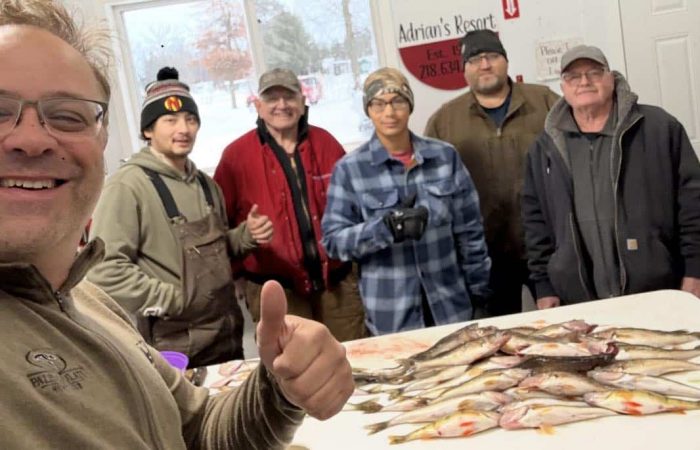anglers with walleyes and saugers-a great catch on lake of the woods mn