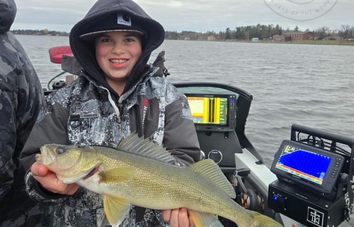 This boy caught a huge fall walleye on the Rainy River near Lake of the Woods MN.