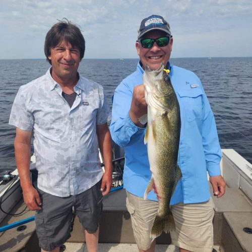 Greg Jones and Joe Henry with a walleye caught on a jig on Lake of the Woods