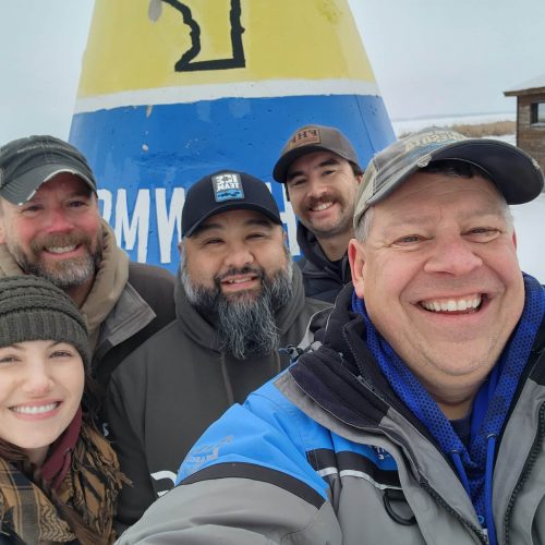 Group photo, having fun at the NW Angle, northernmost point buoy
