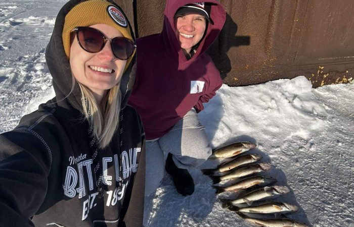 two female anglers with great walleye sauger catch at oak island lake of the woods mn